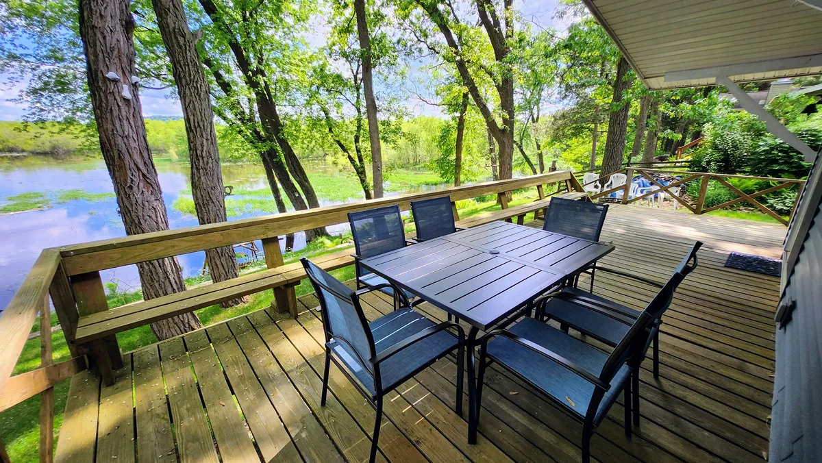 Covered deck over the creek at one of our Wisconsin Dells homes